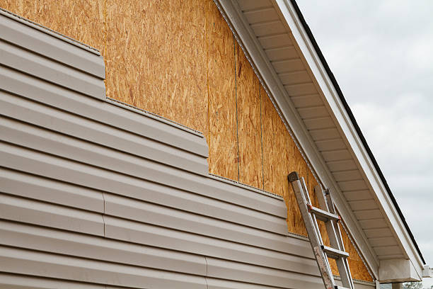 Professional Storm Damage Siding Repair technician working in Forest Hill, MD